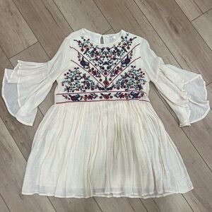 Cute dress with Bell sleeves and embroidered top